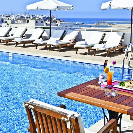 Farah Rabat Hotel Bagian luar foto The pool at the hotel