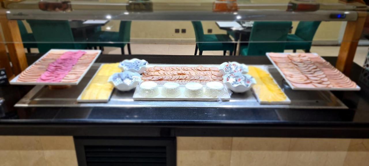 Farah Rabat Hotel Bagian luar foto A display of Chinese desserts