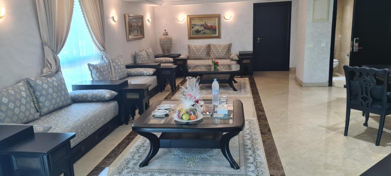 Farah Rabat Hotel Bagian luar foto A living room in a private home