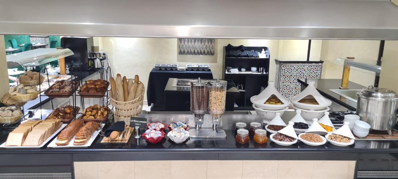 Farah Rabat Hotel Bagian luar foto A breakfast buffet at a hotel