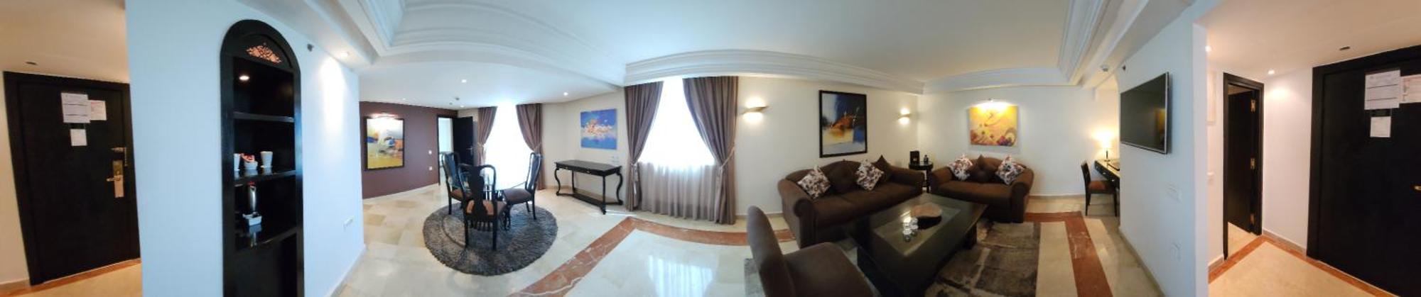 Farah Rabat Hotel Bagian luar foto A living room in a hotel suite