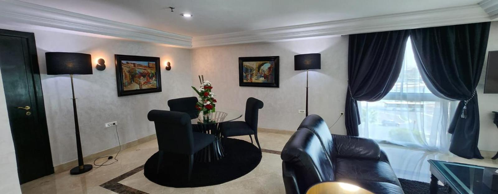Farah Rabat Hotel Bagian luar foto A living room in a hotel