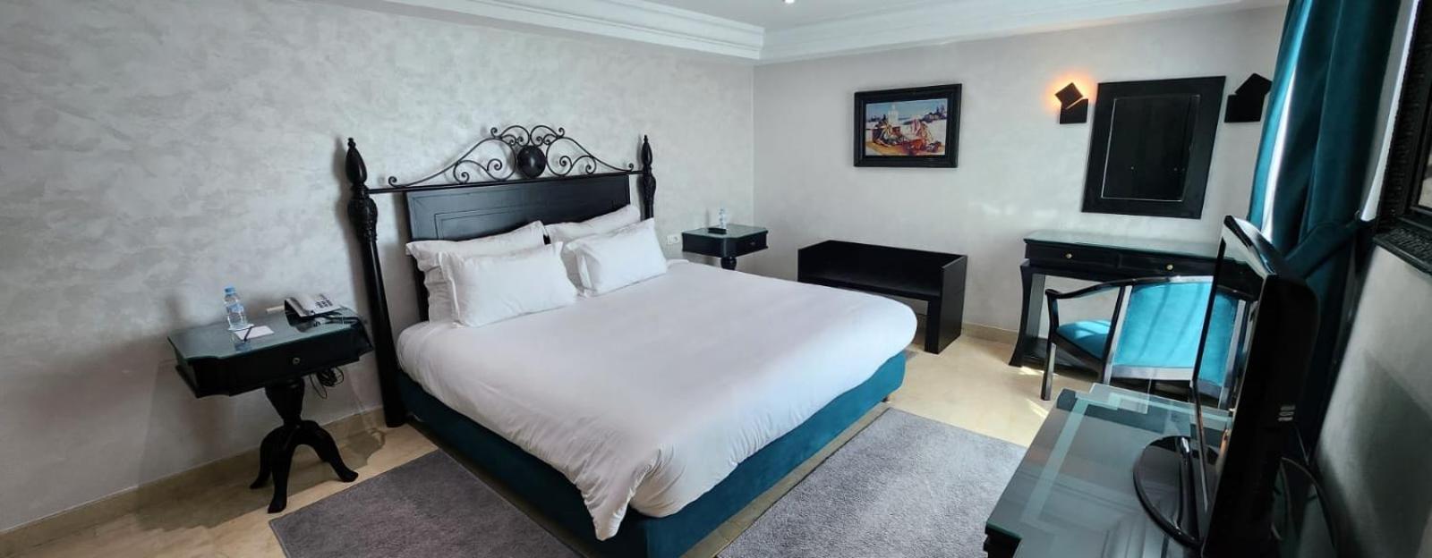 Farah Rabat Hotel Bagian luar foto A bedroom at the hotel