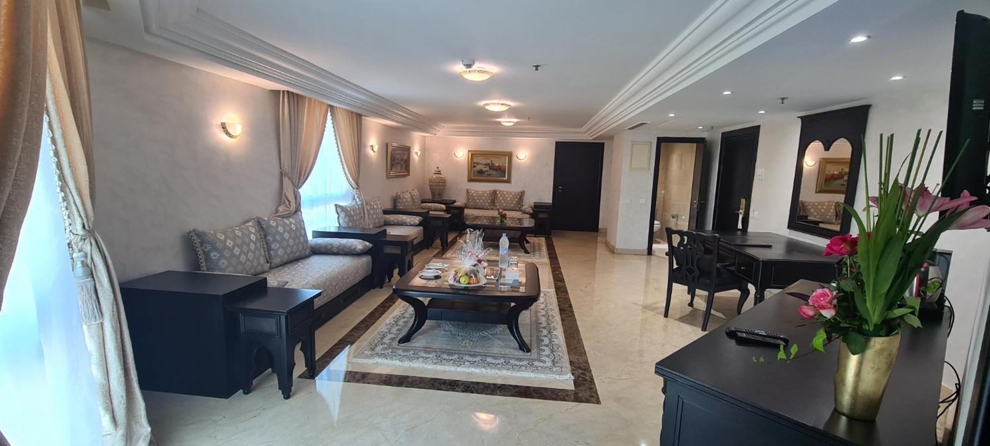 Farah Rabat Hotel Bagian luar foto A living room in a luxury apartment in Cairo