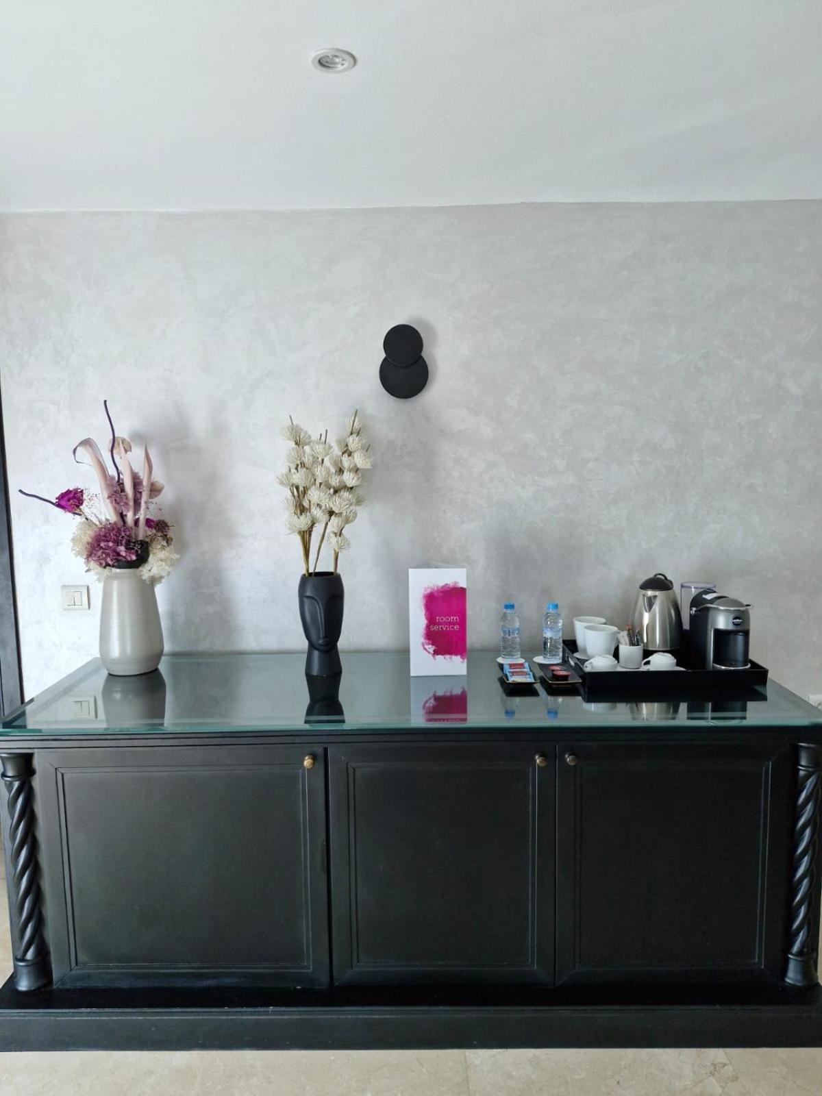 Farah Rabat Hotel Bagian luar foto A Nespresso machine in a hotel room